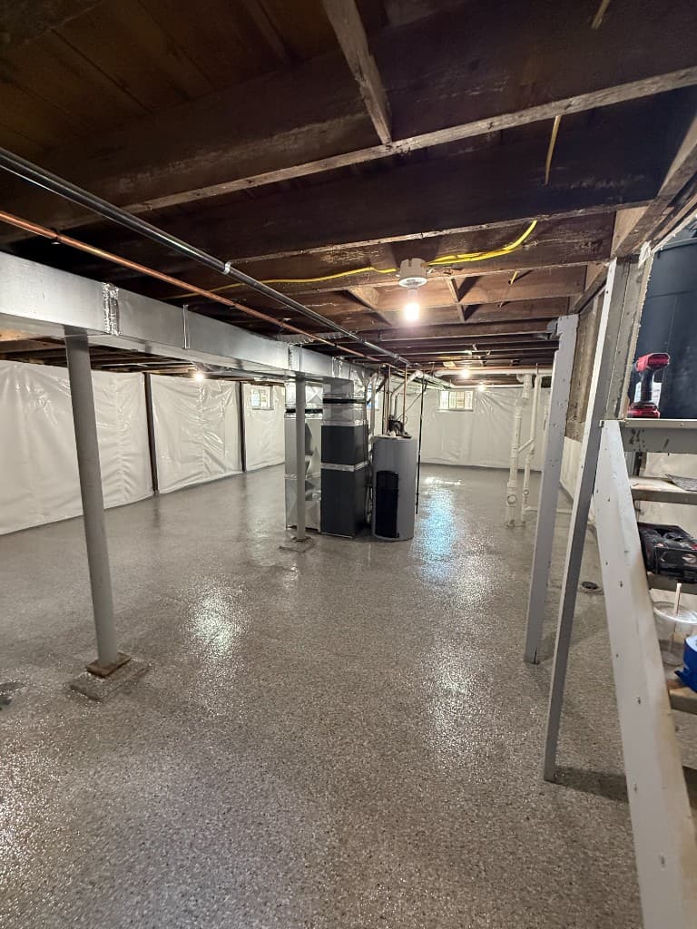 Finished basement floor in Creekbed flake coating.