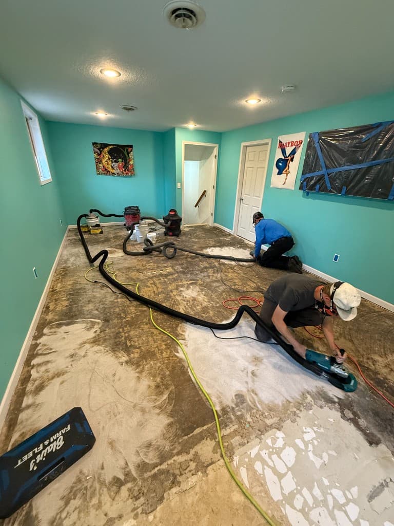 Bare concrete room floor before coating.