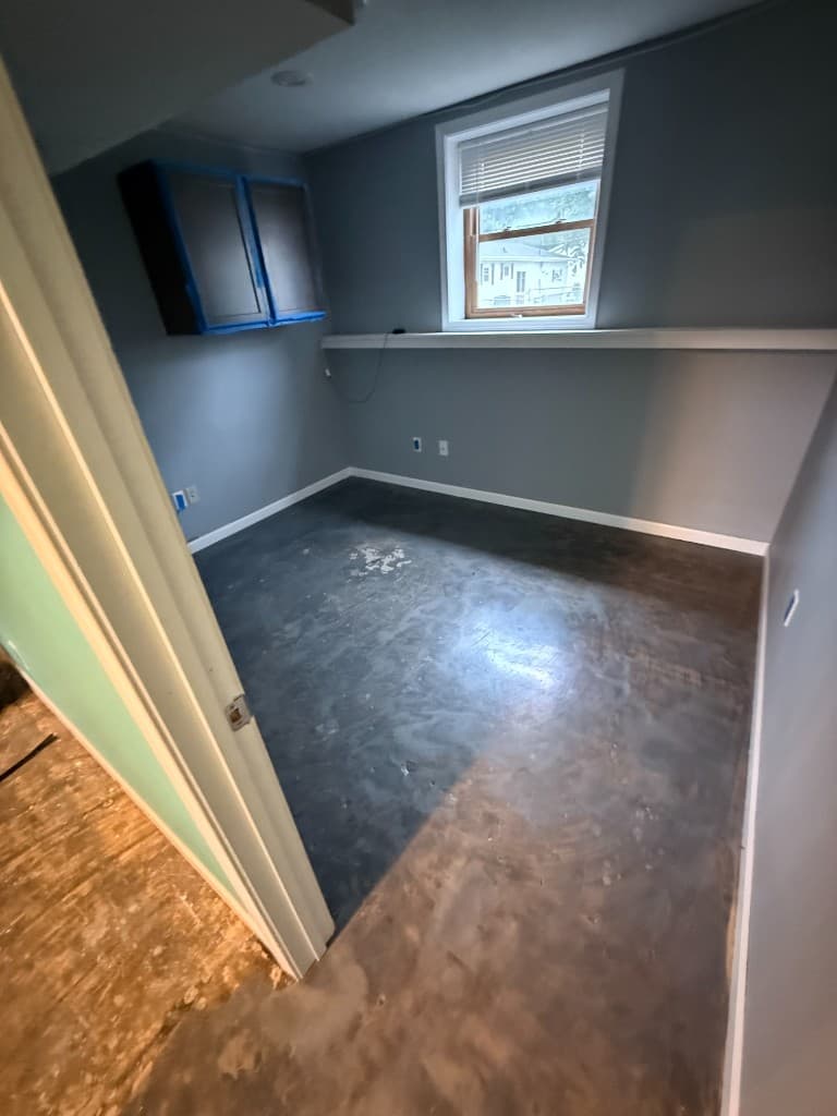 Plain concrete room floor before coating.